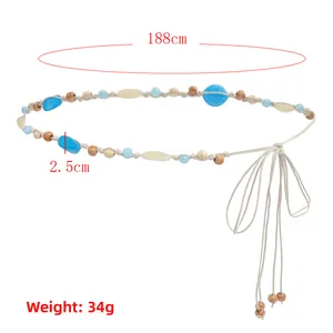 Detail showing bohemian woven waist rope with blue beads and tassel fringe design