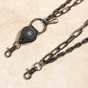 Multi-layer gunmetal punk chain with vintage cowhide leather shield and sunburst stud
