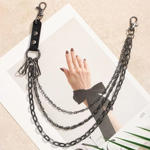 Detail of multi-layer gunmetal chains with black leather strap and lobster clasps