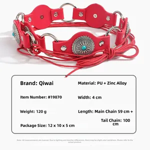 Detail view of red PU leather belt with turquoise inlay and silver engraved metal buckles