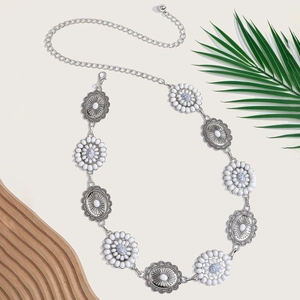 Detailed close-up of Bohemian silver sun flower waist chain with marble stone inlay