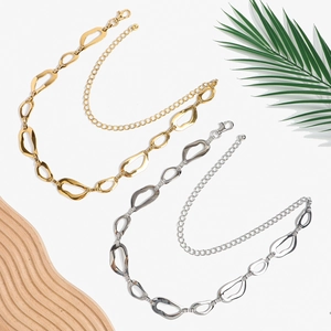 Cintura a catena in metallo a maglie ovali irregolari in oro e argento da donna