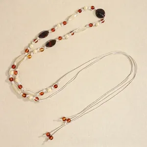 Bohemian hand-woven long necklace with cream cotton rope and mixed amber resin beads