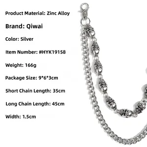 Detail of silver skull punk pant chain with heavy double cuban links and snap hooks