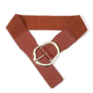 Detail of reddish-brown elastic wide belt with a large irregular gold metal buckle
