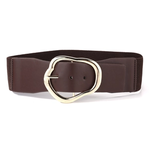 Close-up of brown elastic wide belt with unique liquid-style irregular gold metal buckle