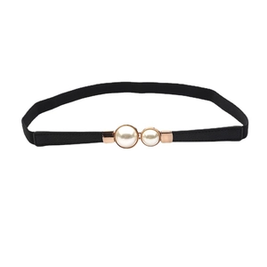 Elegant elastic waist belt for women with double pearls on a gold metal buckle