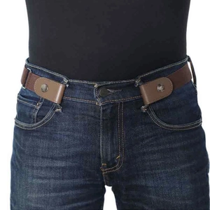 Brown buckle-free elastic stretch belt shown on blue denim jeans for a minimalist look