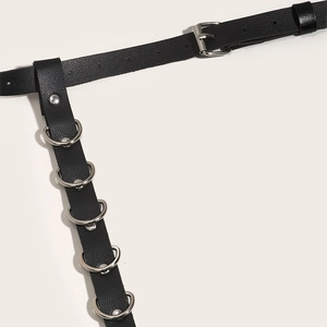 Punk style black leather belt with silver D-rings and metallic buckle for women