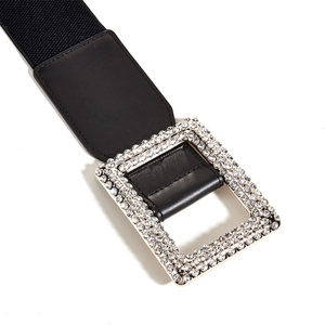 Women's wide elastic waist belt with a sparkling rhinestone rectangle buckle in black