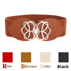 Detail of heart-shaped gold alloy buckle on brown elastic waist belt with color options
