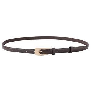 Close-up of a slim dark brown PU leather belt with a polished gold metal pin buckle