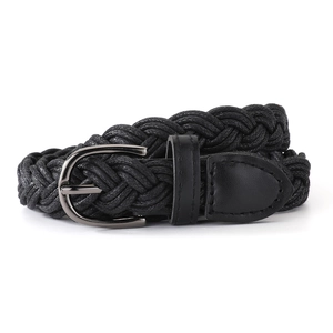 Close-up of black braided waist belt with D-ring buckle and faux leather texture