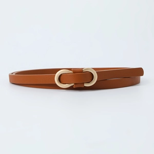 Close-up of the fine brown PU leather belt with a golden double-loop buckle design