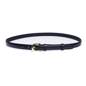 Detail of a slim black leather belt featuring a minimalist golden metal buckle for women