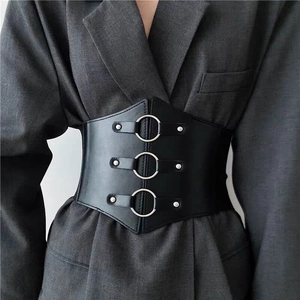 Women's black vintage corset belt with silver rings and rivets for dresses or suits