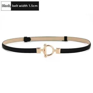 Detailed close-up showing 1.5cm width of black leather belt with golden metal T-buckle