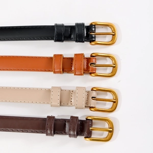 Lot de quatre ceintures fines en cuir vintage pour femmes avec boucles dorées