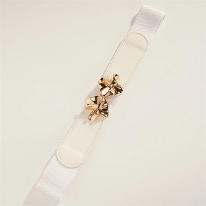 Close-up of a white elastic waist belt featuring a gold floral metal buckle and leather ends
