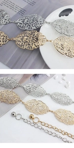 Detailed close-up showing hollow leaf textures and adjustable chain on metal waist belts