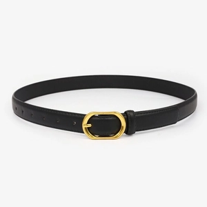 Close-up of black leather belt with elegant golden oval metal buckle and neat edge stitching