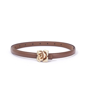 Detail of dark brown leather thin belt with golden 3D rose flower metal buckle