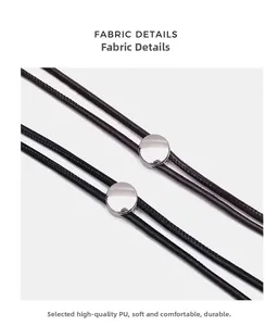 Détail rapproché d'une ceinture fine en similicuir PU avec boucle à ressort polie