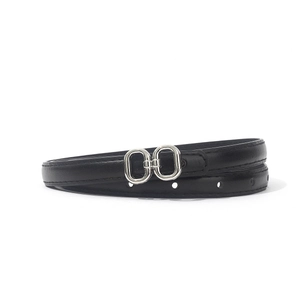 Detail view of slim black leather belt with a polished silver double oval buckle for women
