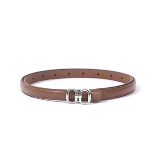 Elegant slim brown leather belt with a polished silver G-style buckle for women dresses