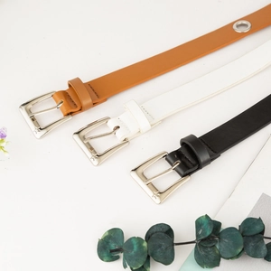Three-pack skinny faux leather belts in black white and brown with star buckle