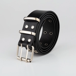 Close-up of black leather punk belt featuring silver double-prong buckle and metal eyelets