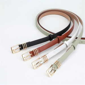 Detail showing four colors of women's belts with golden square buckles and metal rings