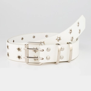 Close-up of white punk belt featuring double-prong silver buckle and star-shaped eyelets