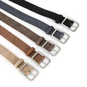 Detail view of multicolored matte suede belts with silver rectangular metal buckles