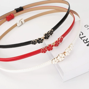 Three-piece set of adjustable patent leather slim belts with floral buckles in black, red, white