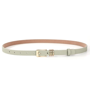 Detail of mint green faux leather skinny belt with golden buckle and decorative metal loops