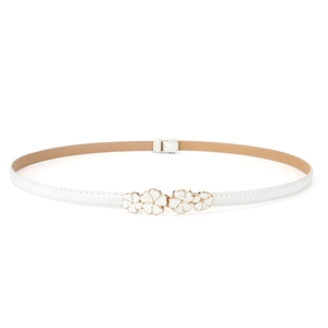 Detail of white floral gold metal buckle on adjustable skinny faux leather belt