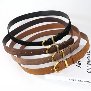 Minimalist suede belts with gold buckles in black, brown, and ginger yellow for jeans