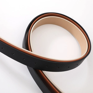 Detailed macro view of the multi-color leather belt texture and metal eyelet adjustment