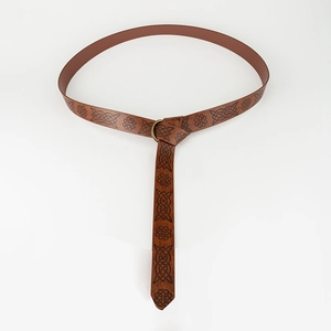 Macro view of medieval Viking leather belt with embossed Celtic knot and bronze O-ring