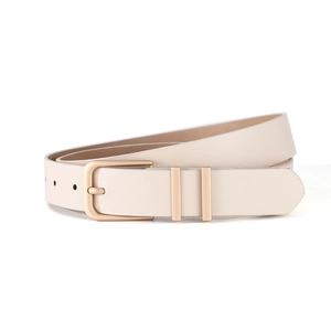 Detail of cream leather belt showing the gold pin buckle and double metal rings