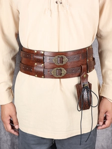 Close-up of vintage Viking belt with Celtic knot embossing and attached leather pouch