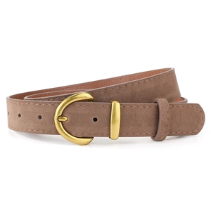 Detail view of brown faux suede belt featuring a classic golden metal U-shaped pin buckle