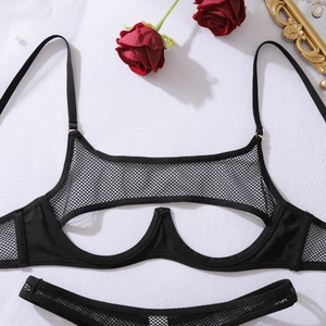 Detailed view of black fishnet lace lingerie set with underwire support and cut-outs