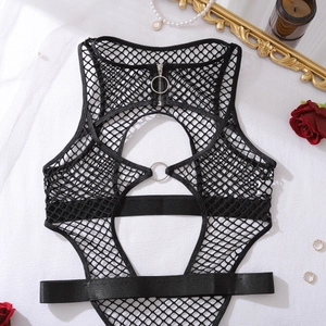 Detailed close-up of black fishnet bodysuit featuring metal ring details and hollow-out design