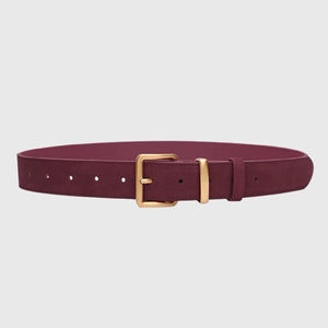 Detail of burgundy faux suede belt with high-quality gold square metal buckle and holes