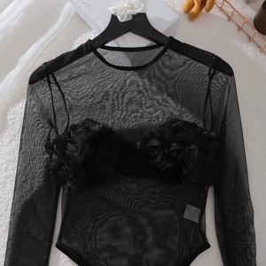 Detail of long sleeve mesh bodysuit featuring elegant 3D black rose floral embroidery