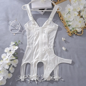 Flat lay of white lace bodysuit set with garter belts, mesh texture and silk details