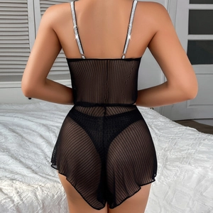 Detail of sheer black mesh lingerie set with sparkly rhinestone shoulder straps from behind