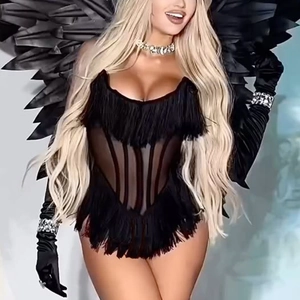 Detail of sexy black mesh bodysuit with long fringe, rhinestone gloves and feather wings